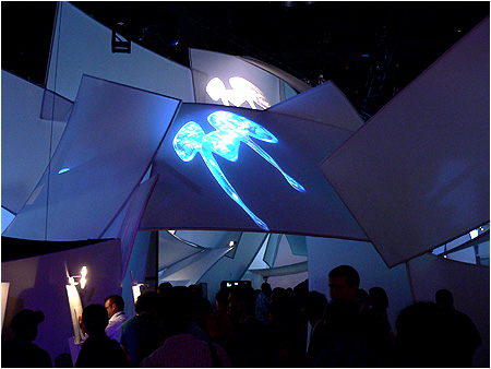 I-Mockery is at E3 and realizing that the bad economy isn't hurting the game industry if they can afford crazy booth displays like this.