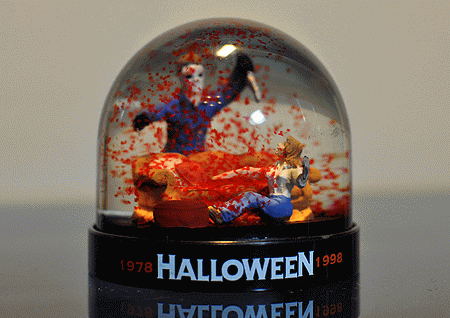 Michael Myers attacks Laurie Strode in a snow dome sea of glitter blood!
