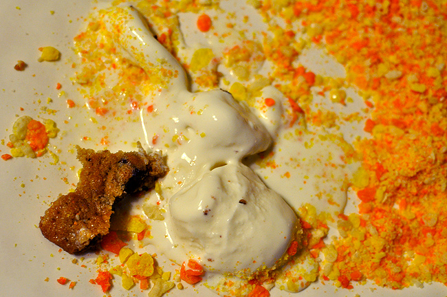 The remnants of the Candy Corn Pebbles Cereal Ice Cream Sandwich!
