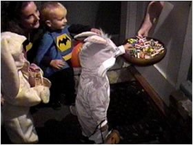 Kids getting candy, not knowing they're going to lose it soon.