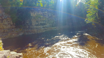Rainbows forming in the Grand Basin while sitting next to Re's tree.
