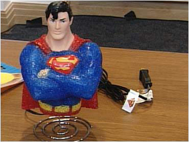 His costume is gay enough... does it really need the glitter too?
